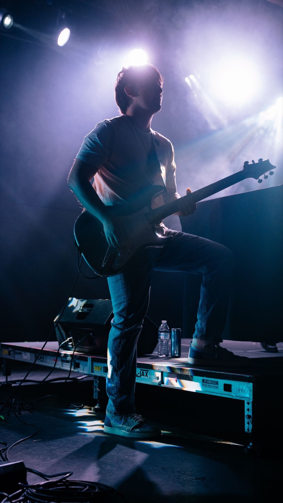 Kristian Cruz on guitar under blue light at Beer City Music Hall, Oklahoma City