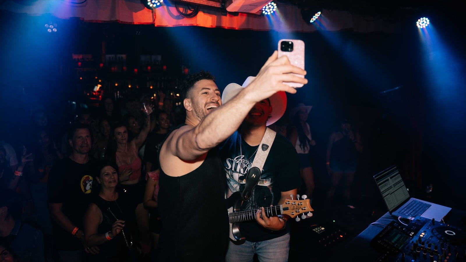 Jordan Miller taking a selfie with the crowd behind him at Last Exit Live, Phoenix