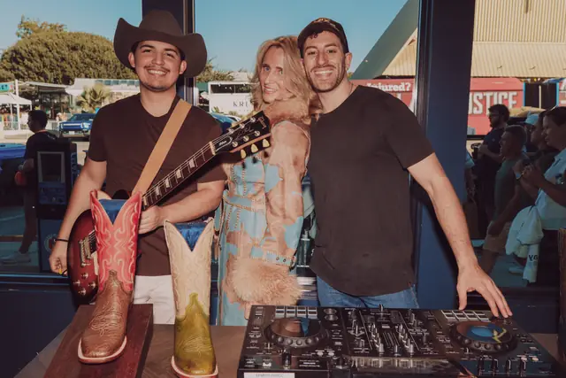 Jordan Miller and Kristian Cruz with a guest at the Lucchese pop-up