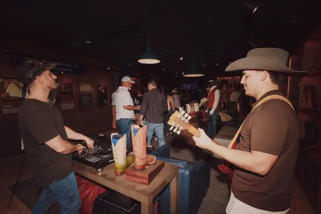 Guests at the MIXMODE set during the Lucchese F1 Weekend pop-up on South Congress