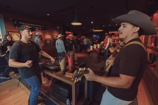 Guests at the MIXMODE set during the Lucchese F1 Weekend pop-up on South Congress