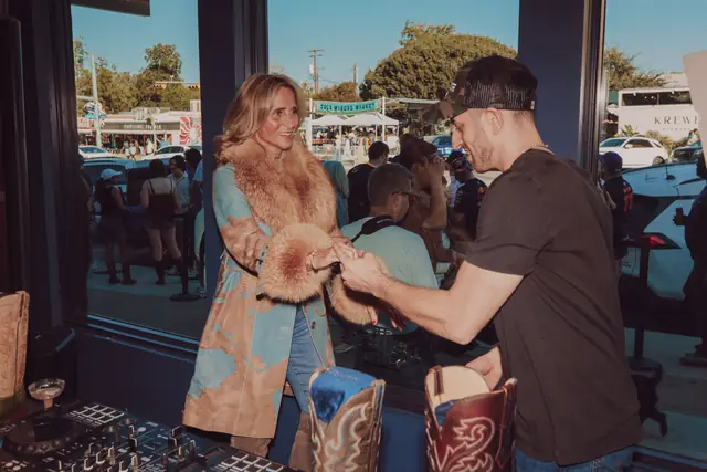 Guests at the MIXMODE set during the Lucchese F1 Weekend pop-up on South Congress