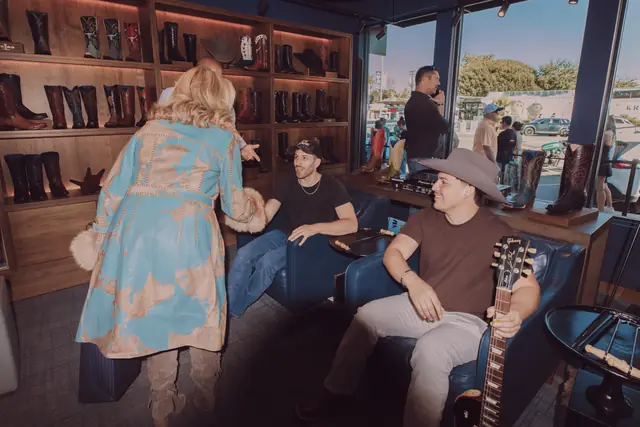 Guests at the MIXMODE set during the Lucchese F1 Weekend pop-up on South Congress